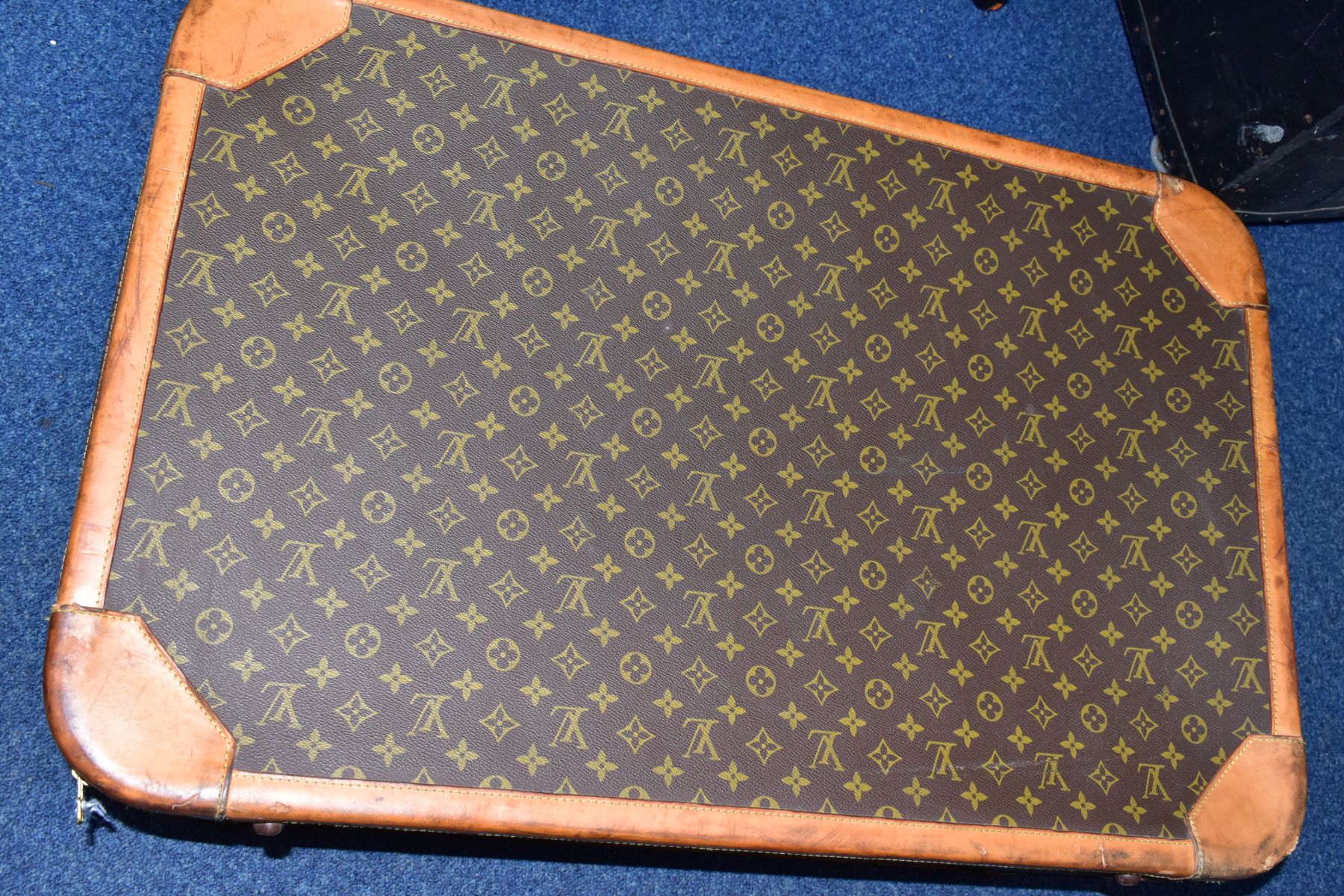 A LOUIS VUITTON MONOGRAM SUITCASE, tan leather trim, with a combination lock (locked, combination - Image 12 of 17