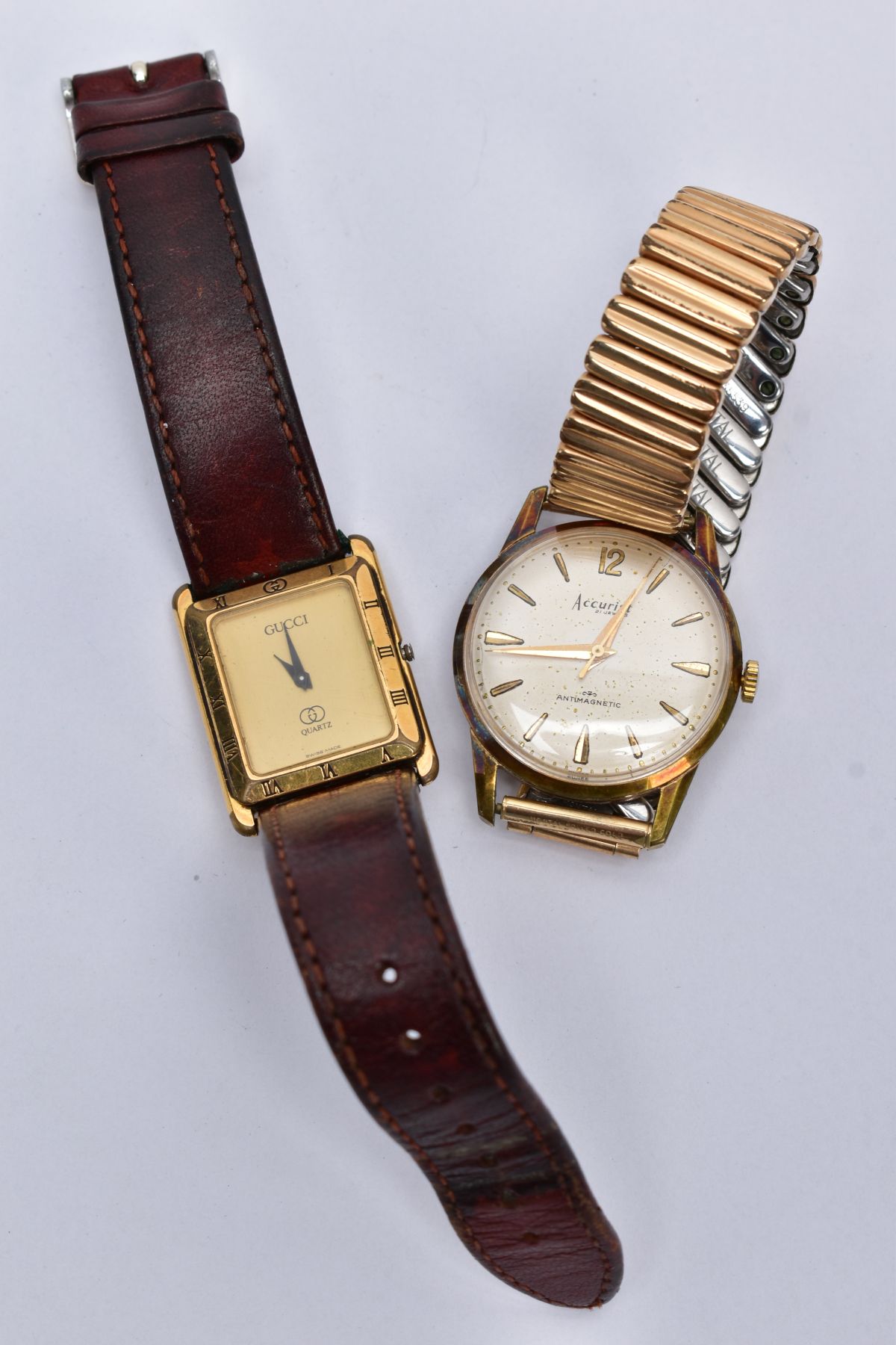 TWO WRISTWATCHES, to include a gent's wristwatch with a tank gold tone dial signed 'Gucci,