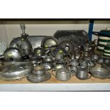 A COLLECTION OF PEWTER WARES etc, mostly of plainished decoration, to include tea pots, milk jugs,