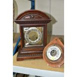 A LATE 19TH CENTURY OAK CASED MANTEL CLOCK, the silvered dial with Arabic numerals, 8 day