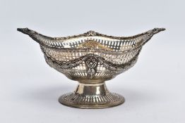 A LATE VICTORIAN SILVER PIERCED BONBON DISH, of an oval form, detailed foliate swags on an