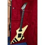 A 1985 GIBSON CUSTOM SHOP XPL EXPLORER GUITAR with a cream finish and black detailing (some