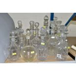 SIXTEEN ASSORTED DECANTERS, various styles age range from late Victorian to mid 20th Century, some