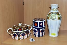 THREE PIECES OF ROYAL CROWN DERBY, comprising an 1128 Imari twin handled oval sucrier and cover,