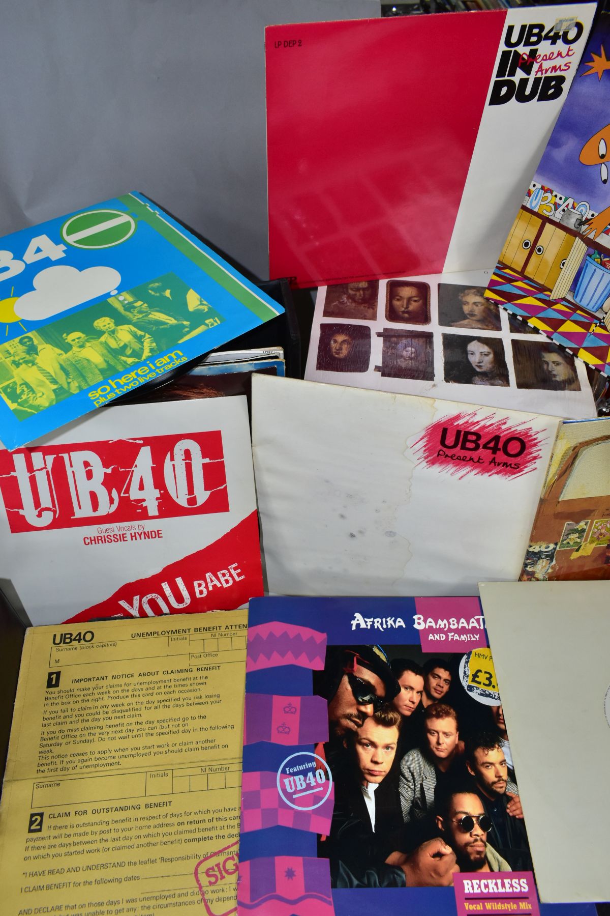 SIXTEEN LP'S AND 12 INCH SINGLES by UB40 including Baggariddim, Signing Off, Rat in the Kitchen,