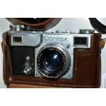 A CONTAX 11 RANGEFINDER CAMERA fitted with a Carl Zeiss Jenar Sonnar 5cm f.1.2 lens, complete with