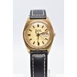 A GENTS GOLD PLATED BULOVA WRISTWATCH, with a round gold dial signed 'Bulova Accutron, Quartz',