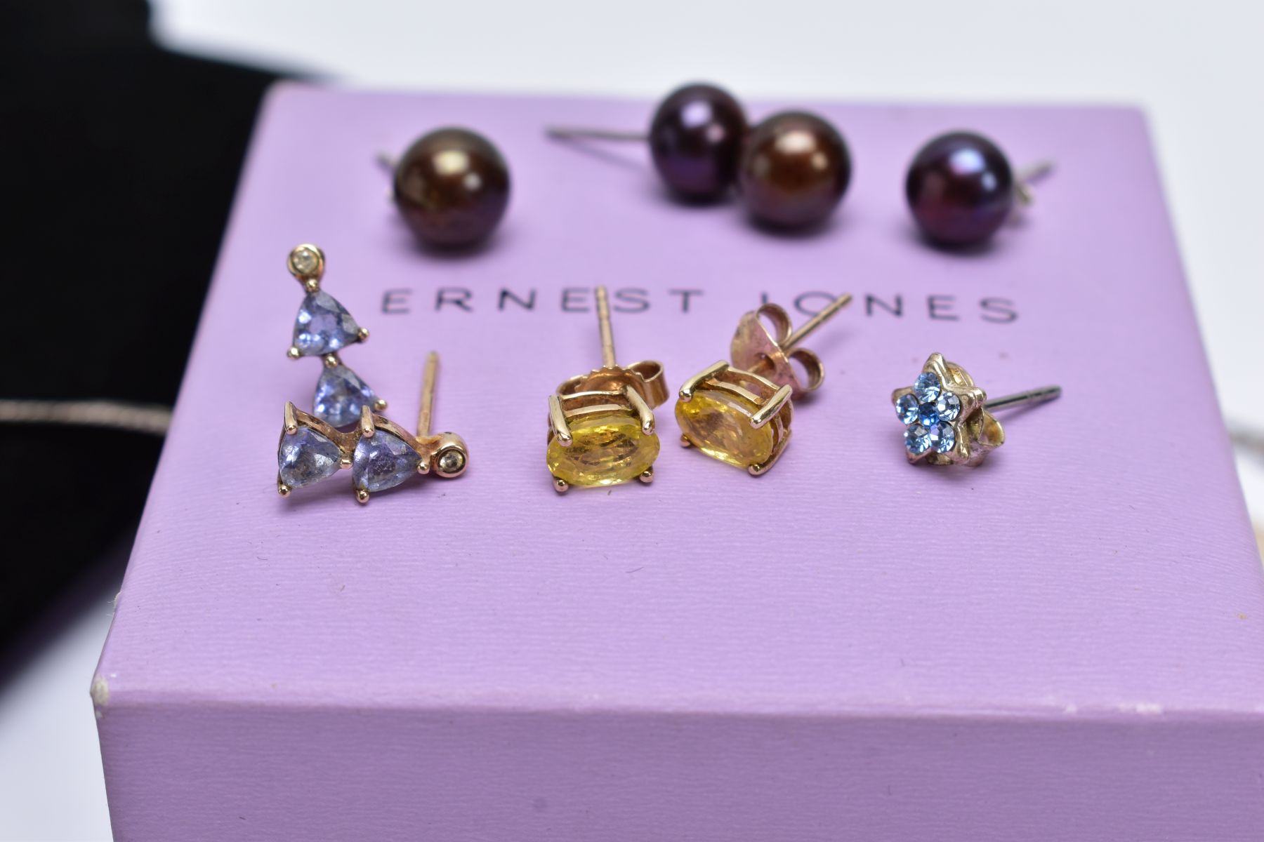 A SELECTION JEWELLERY, to include a pair of stud earrings, each designed with a claw set oval cut - Image 2 of 7