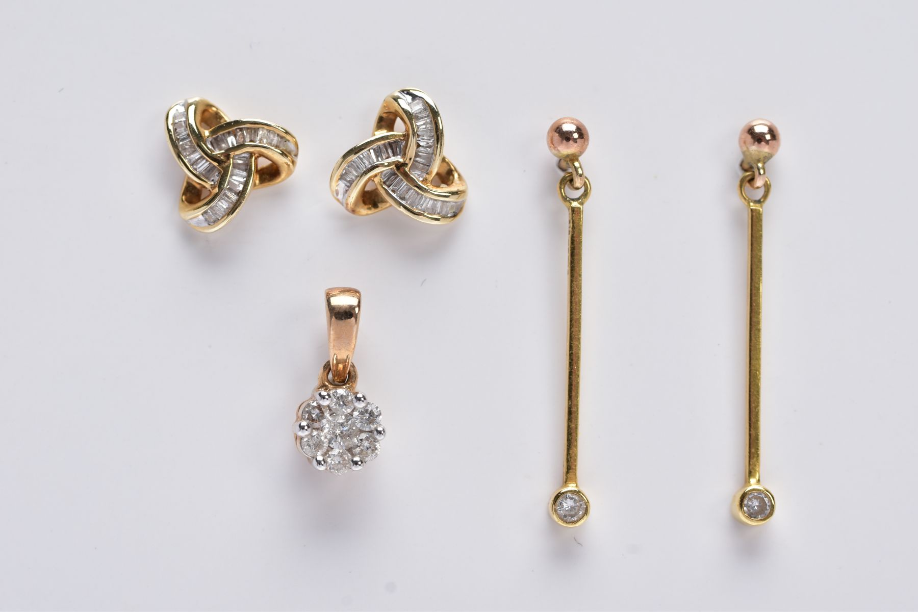 TWO PAIRS OF DIAMOND EARRINGS AND A DIAMOND PENDANT, to include a pair of yellow metal earrings each