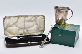 A SILVER JUG AND A CASED BABY FEEDIING SET, the silver jug of a plain polished tapered design fitted