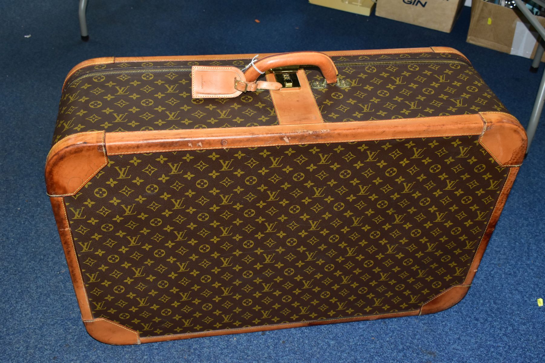 A LOUIS VUITTON MONOGRAM SUITCASE, tan leather trim, with a combination lock (locked, combination - Image 2 of 17