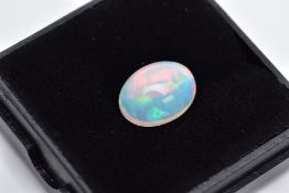 A LOOSE OPAL OVAL CABOCHON CUT STONE, measuring 12.5mm x 9.3mm, weighing approximately 3.30ct