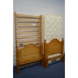 TWO MODERN PINE SINGLE BED FRAMES, with one mattress (3)