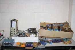 TWO TRAYS CONTAINING ELECTRONIC TEST EQUIPMENT and tools including a mitre saw, corner clamps, a