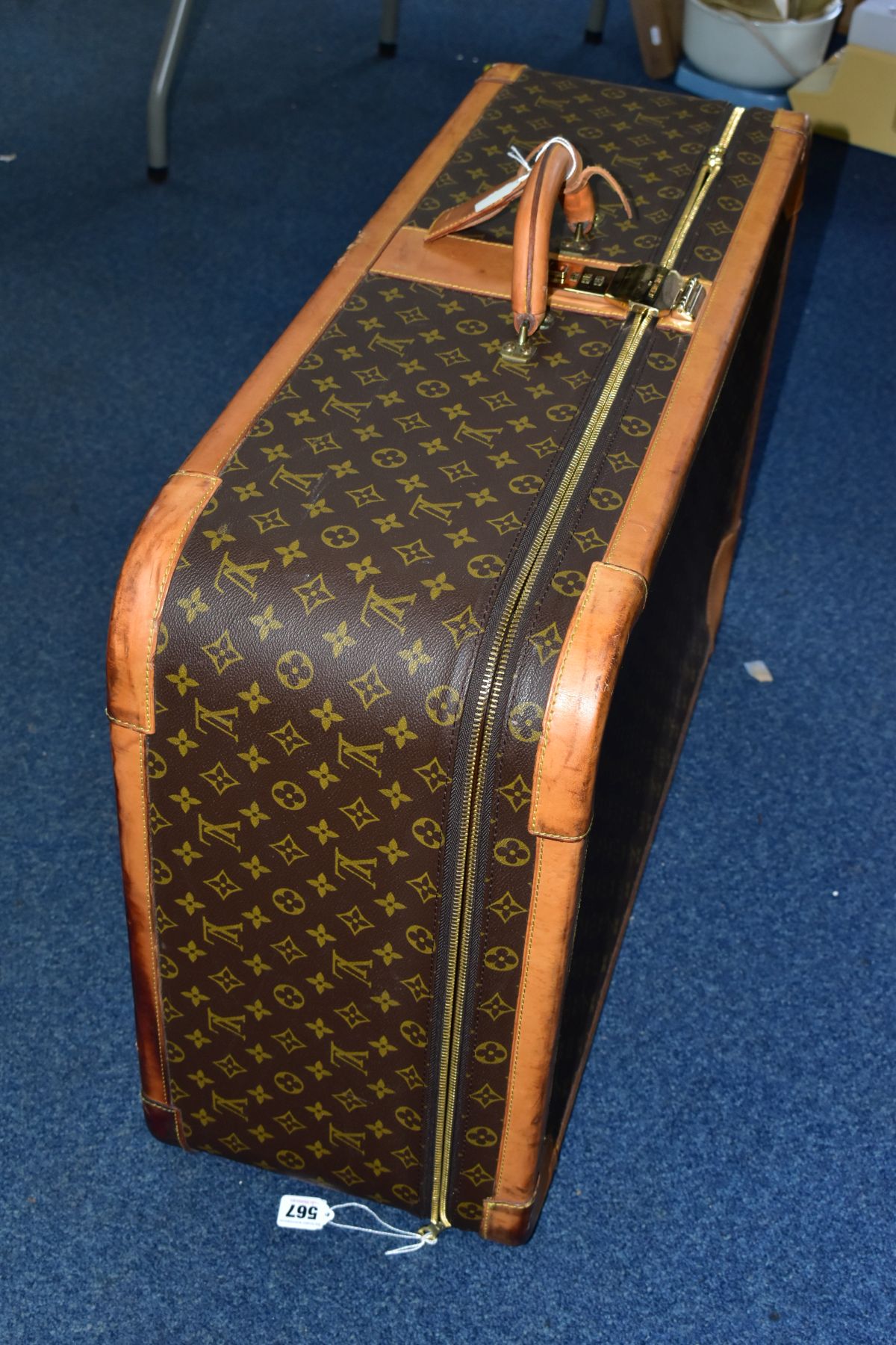A LOUIS VUITTON MONOGRAM SUITCASE, tan leather trim, with a combination lock (locked, combination - Image 8 of 17
