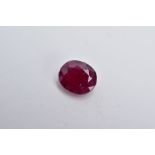 A LOOSE OVAL MIXED CUT RUBY, measuring approximately 8.42mm x 7.2mm, approximate height 1.99ct