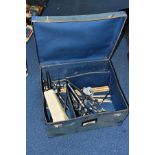 A BLUE FIBRE DRUM HARDWARE CASE containing a pair of Gibralta Tom arms, two Rogers?, double tom arms