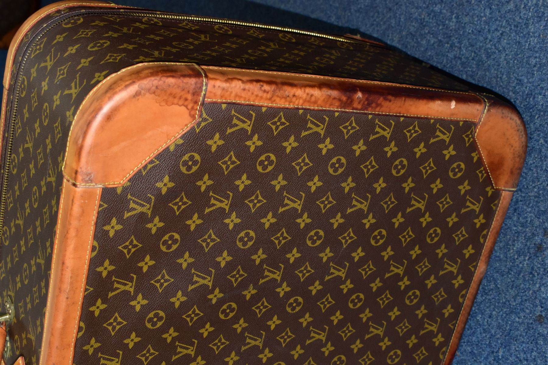 A LOUIS VUITTON MONOGRAM SUITCASE, tan leather trim, with a combination lock (locked, combination - Image 17 of 17