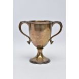 A SILVER TWIN HANDLED TROPHY CUP, scroll handles to the sides, cup of plain design and engraved to