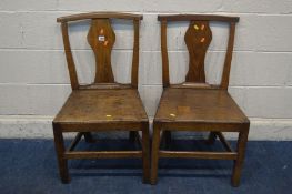 A MATCHED PAIR OF GEORGIAN OAK AND ELM SPLAT BACK HALL CHAIRS,