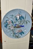 A CHARLES PILLIVUYT & CO (FOECY) PORCELAIN CHARGER, pale blue ground decorated with a parakeet