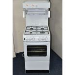 A NEW WORLD GAS OVEN with eye level grill.