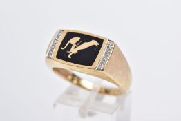 A GENTS 9CT GOLD SIGNET RING, designed with a rectangular black enamel panel depicting a greyhound