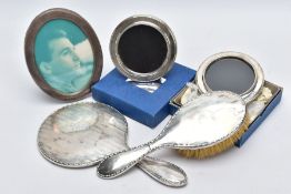 A SELECTION OF ITEMS, to include a silver engine turn designed hairbrush and matching handheld