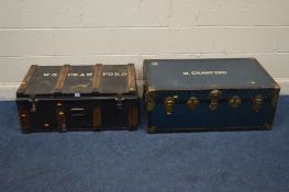 A VINTAGE METAL AND BEECH BANDED TRUNK, and a blue traveling suitcase, with the owners name