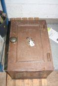 A SMALL VINTAGE SAFE with one key 33cm wide 49cm deep and 32cm high