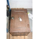 A SMALL VINTAGE SAFE with one key 33cm wide 49cm deep and 32cm high