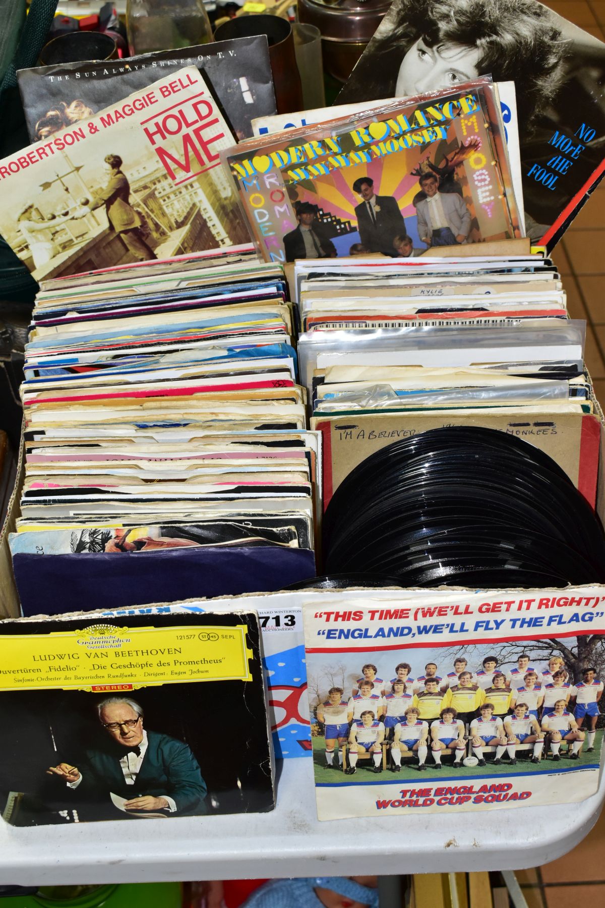 A BOX OF APPROXIMATELY TWO HUNDRED AND FIFTY 7'' SINGLES, mostly 1980's to include Rock and Pop -