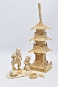 A LATE 19TH CENTURY JAPANESE IVORY OKIMONO OF A VEGETABLE VENDOR AND A YOUNG BOY MOUNTED ON A