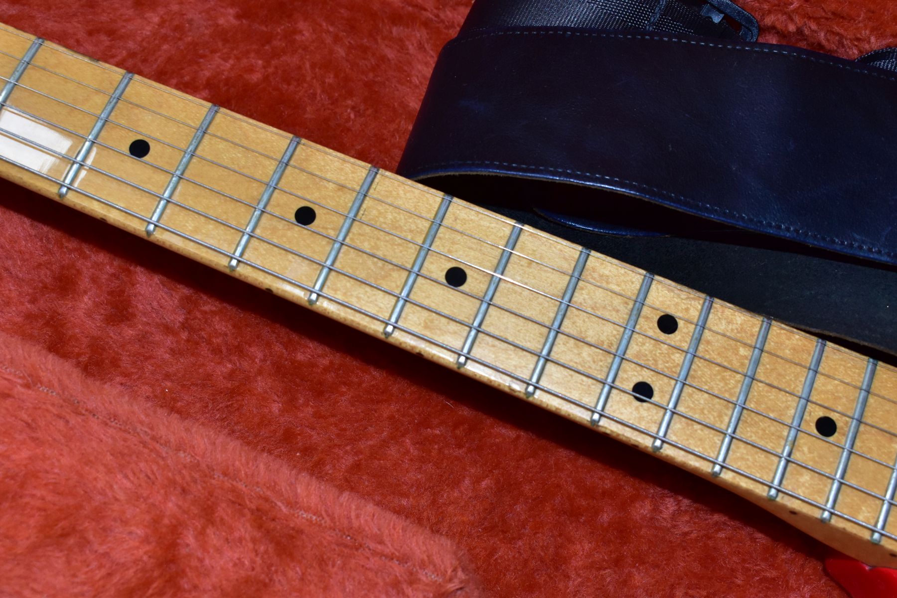 A 1984 USA FENDER STRATOCASTER GUITAR, in red with a one piece maple neck and fingerboard, gold - Image 3 of 6