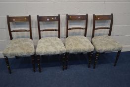 A SET OF FOUR REGENCY MAHOGANY ROPE BACK CHAIRS with upholstered seat pads