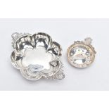 A SILVER BON BON DISH AND A WHITE METAL ASHTRAY, the bonbon dish of a flower shape, with two