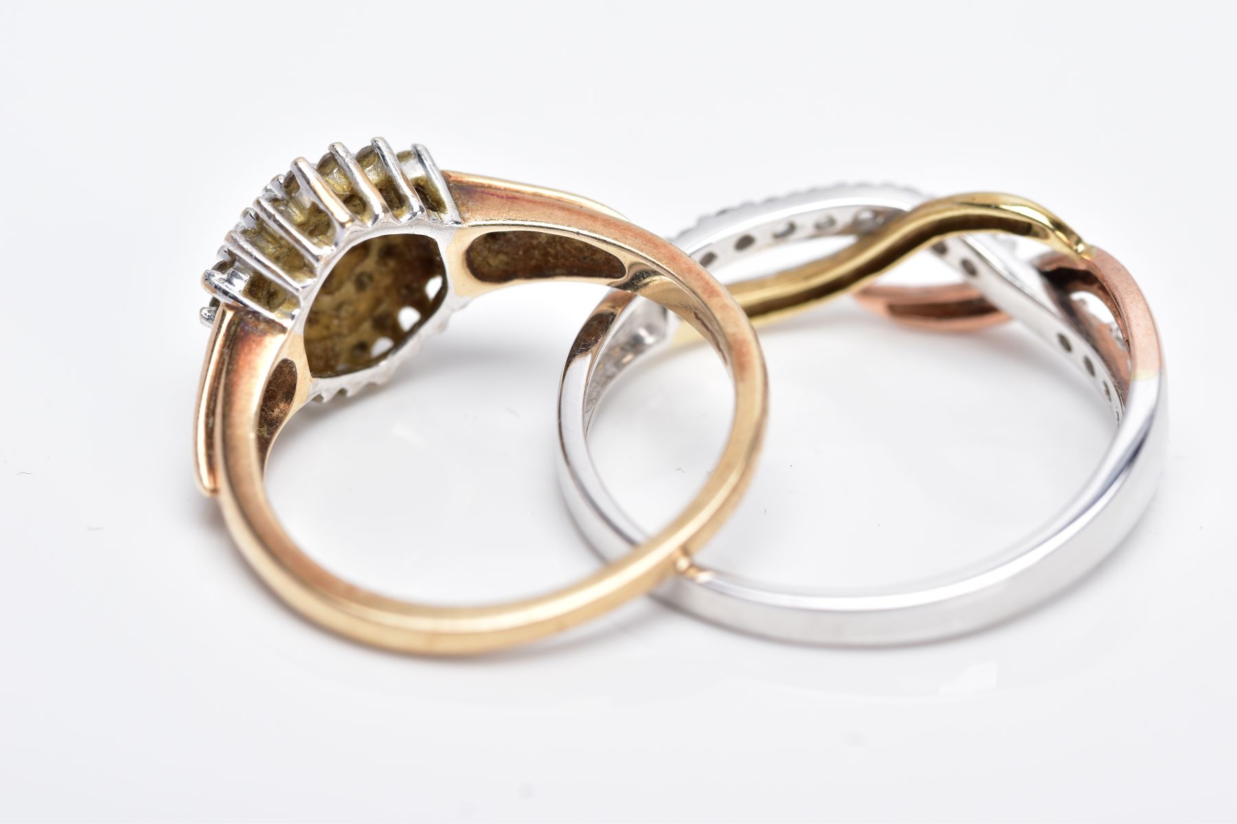 TWO 9CT GOLD DIAMOND RINGS, the first designed as a raised cluster set with round brilliant cut - Image 3 of 3