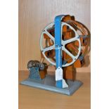 A KW CENTRIMOTOR HAND CRANKED TINPLATE FERRIS WHEEL, appears complete and in fairly good