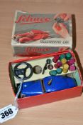 A BOXED SCHUCO TELESTEERING 3000 CAR, playworn condition, missing ball and some of the wooden