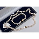 A CULTURED PEARL NECKLET AND MATCHING BRACELET, a strand of cultured pearls individually knotted