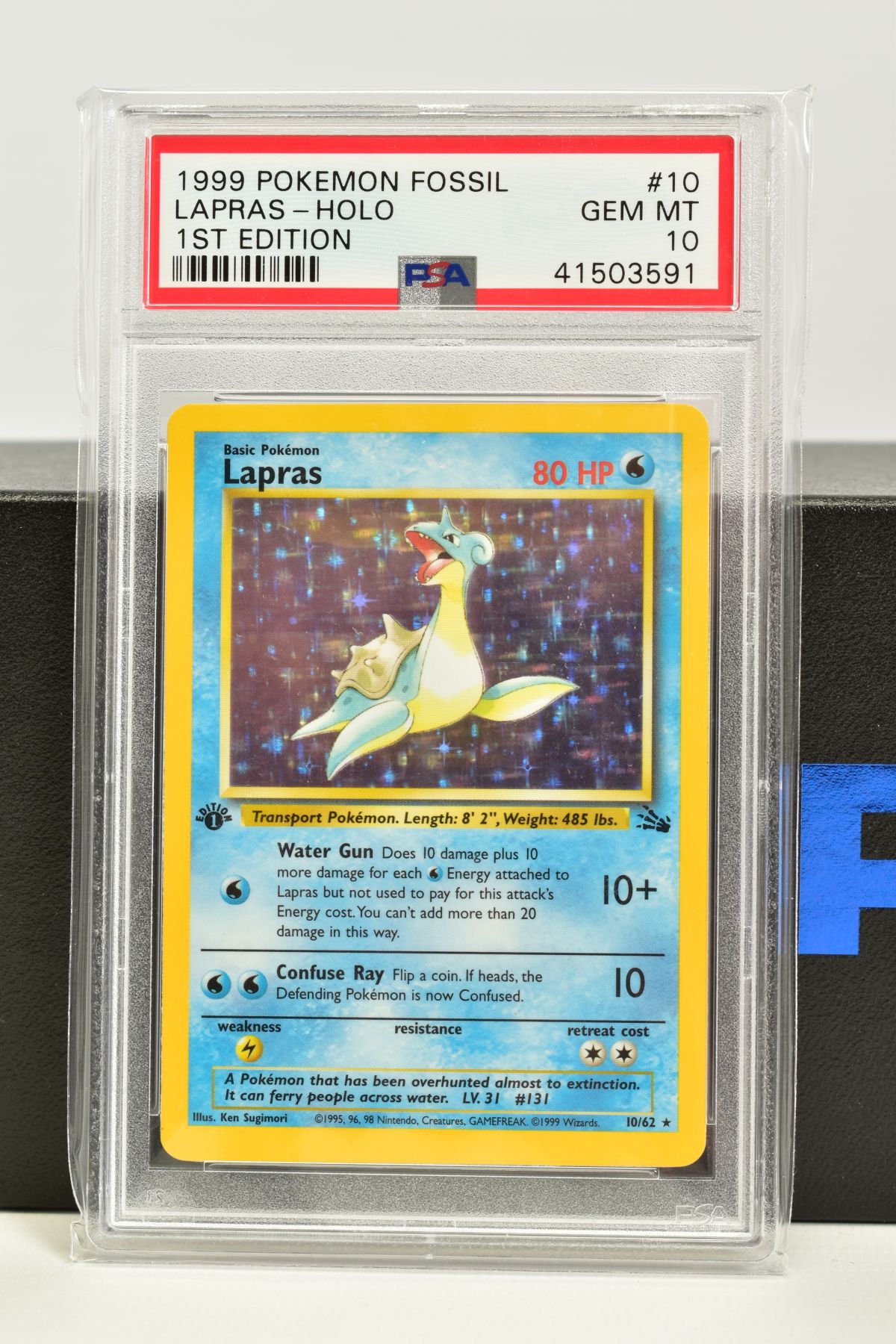 A PSA GRADED POKEMON 1ST EDITION FOSSIL SET LAPRAS HOLO CARD, (10/62), graded GEM MINT 10 and sealed