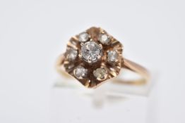 A 9CT GOLD SPINEL CLUSTER RING, the raised cluster set with circular cut colourless spinel's