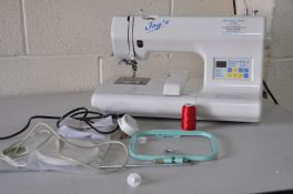 A JOYS PF 5001 EDUCATION MODEL SEWING MACHINE with SD card compatibility, designed to work with
