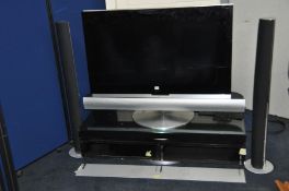 A Bang & Olufsen Beovision 7 - 40 40ins tv on motorised moving stand with connected sub-woofer and