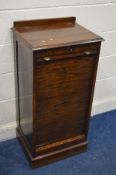 AN EARLY 20TH CENTURY OAK TAMBOUR FRONT FILING CABINET, enclosing nine drawers, width 49cm x depth