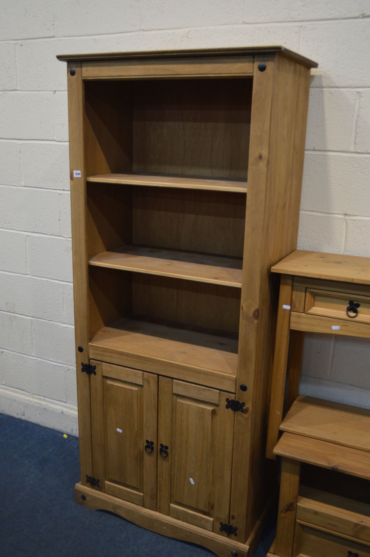 A CORONA PINE OPEN BOOKCASE with double cupboard doors, width 81cm x depth 44cm x height 183cm, a - Image 2 of 3