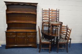 AN OAK GATE LEG TABLE, six ladder back chairs, along with a mahogany dresser with two drawers, width