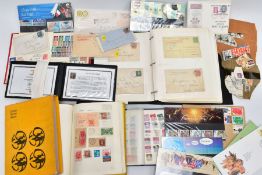 A COLLECTION OF STAMPS to include a small box of stamps with a general collection, a few GB