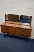 A MID TO LATE 20TH CENTURY TEAK DRESSING CHEST/TABLE, with a rectangular swinging mirror, and four