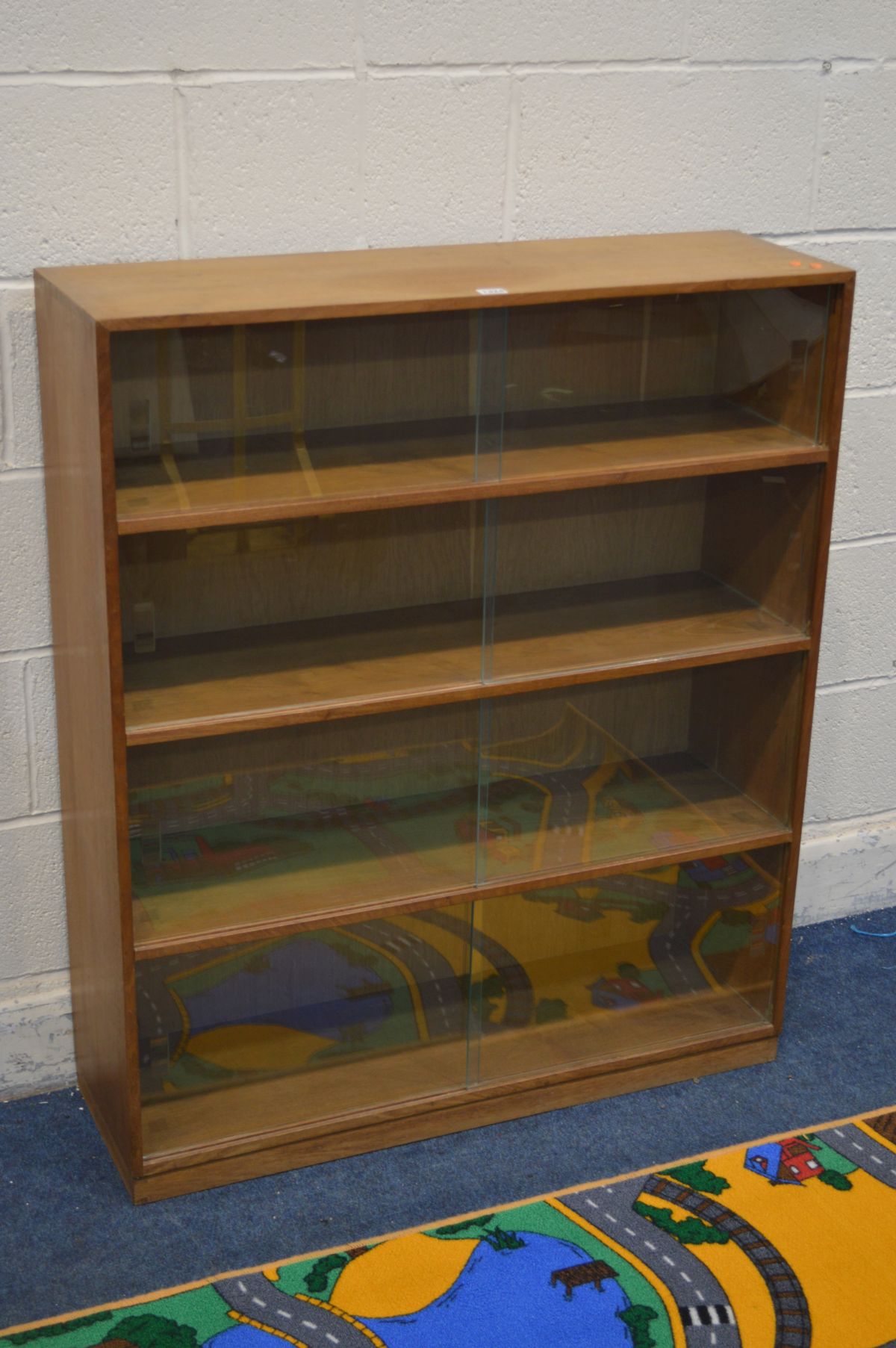 AN OAK FOUR TIER GLAZED SLIDING BOOKCASE, width 92cm x depth 29cm x height 109cm, along with a floor - Image 2 of 4